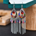 Brilho e Sofisticação em Cada Detalhe! ✨Brincos Elegantes Boho-Chic – Multi camadas de cristal e strass, com design em formato de gota e franjas em corrente. Uma joia delicada em liga metálica para mulheres que amam